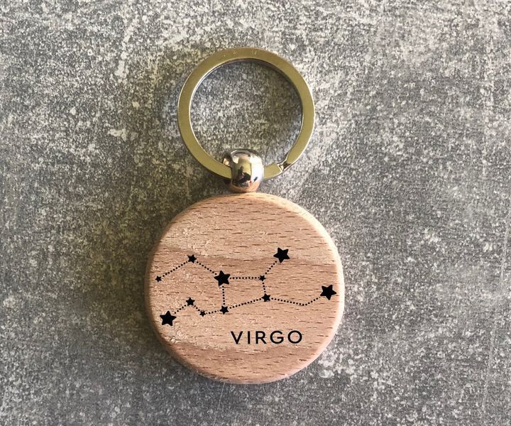 Round wooden keychain with the zodiac constellation "Virgo"
