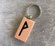 Wooden keychain with the Elder Futhark rune "Vunyo"