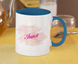 A mug with a print of Inna's name, white and blue