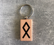 Wooden keychain with the Elder Futhark rune "Othal"