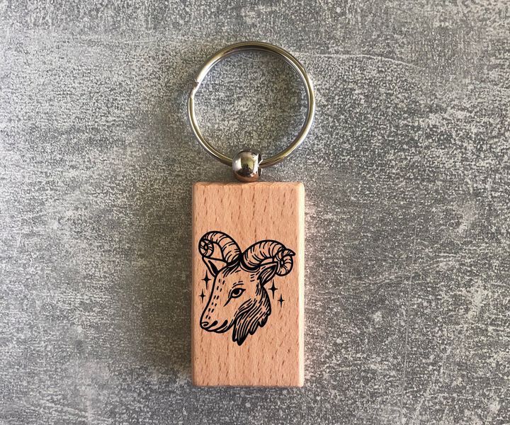 Wooden keychain with the image of the zodiac sign "Capricorn"